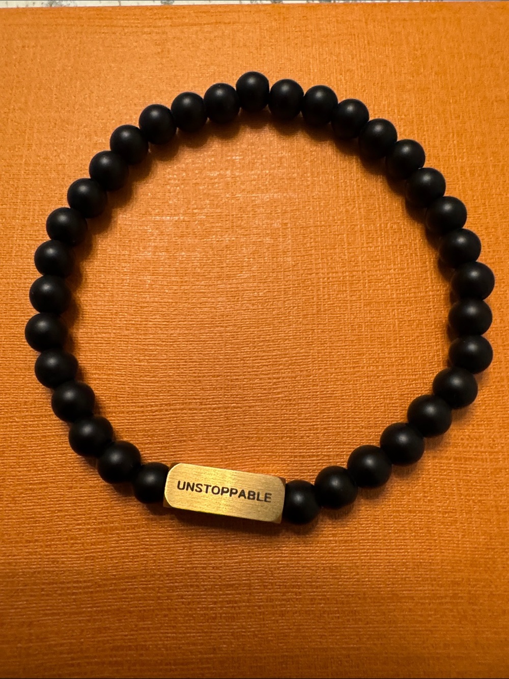 Unstoppable Black Beaded Bracelet with Gold Bar